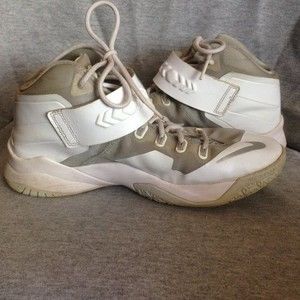 White & grey Nike shoes in youth size 7